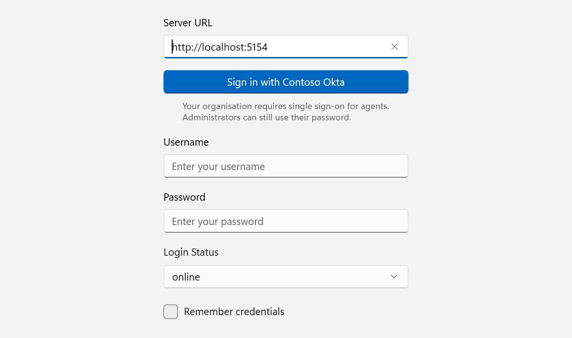 DChat Windows desktop app sign-in screen with a Sign in with Contoso Okta button, a note that the organisation requires single sign-on for agents, and username and password fields